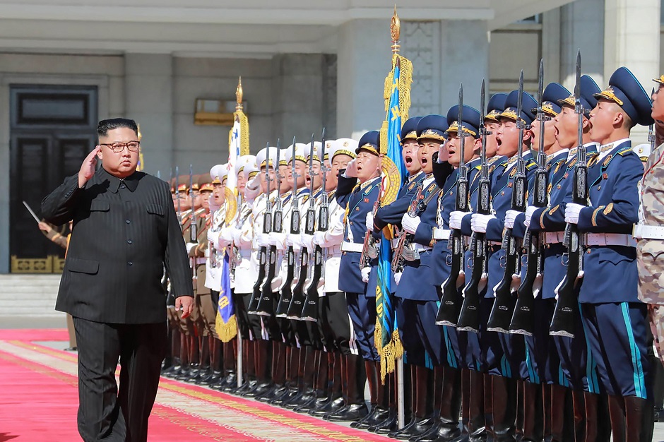 North Korea's leader Kim Jong Un (2nd L) reviewing an honour guard at the 70th founding anniversary of the Democratic People's Republic of Korea (DPRK) in Pyongyang. This picture taken on September 9, 2018 and released by North Korea's official Korean Central News Agency (KCNA) on September 10, 2018. PHOTO: AFP