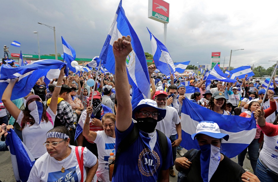 Demonstrators take part in a march against Nicaraguan President Daniel Ortega's government in Managua, on September 9, 2018. - Last week, Ortega expelled the United Nations human rights mission after it published a report criticizing the 