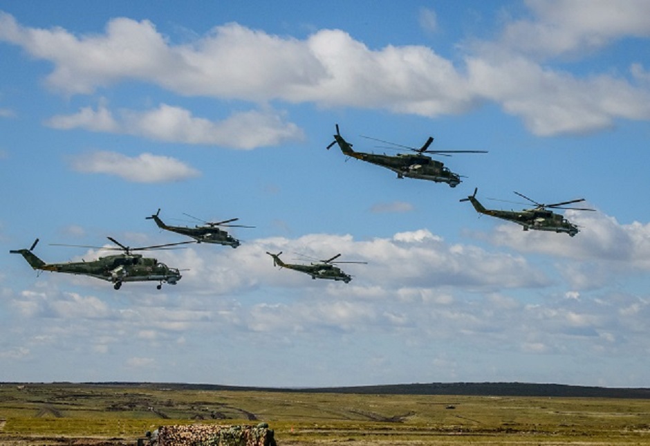 Russian military helicopters participate in the Vostok-2018 (East-2018) military drills at Tsugol training ground PHOTO: AFP