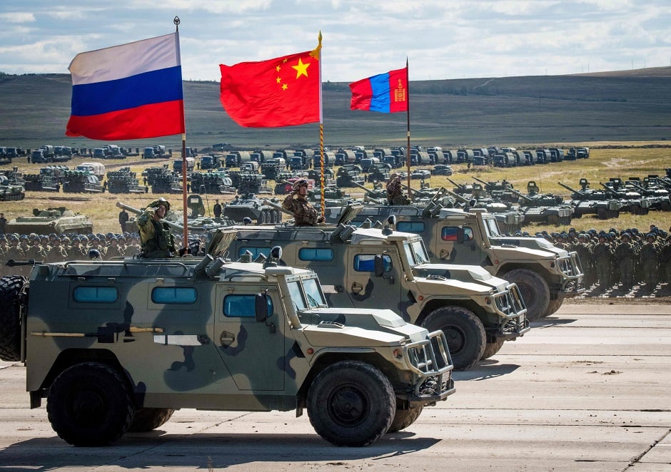 Russian, Chinese and Mongolian troops and military equipment parade at the end of the day of the Vostok-2018 PHOTO: AFP
