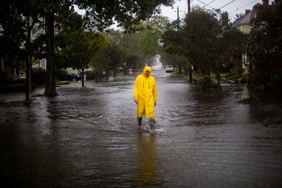  A man walks through flooded streets during the passing of Hurricane Florence in the town of New Bern PHOTO: AFP
