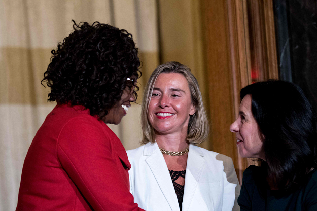 Costa Rican Foreign Minister Epsy Campbell Barr (L) greets European Union Foreign Policy Chief Federica Mogherini (C) and Montreal Mayor Valerie Plante during the Women Foreign Ministers' Meeting. PHOTO: AFP