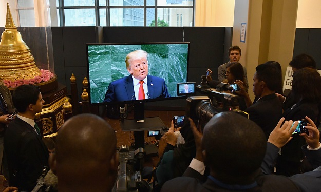 Members of the media watch US President Donald Trump address the 73rd session of the General Assembly United Nations outside the GA Hall in New York on September 25, 2018. PHOTO: AFP