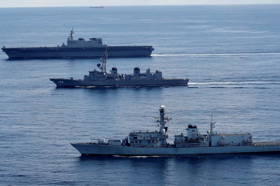 British frigate HMS Argyll (front), Japanese destroyer Inazuma (C) and Japanese helicopter carrier Kaga take part in a joint naval drill in the Indian Ocean. Reuters 