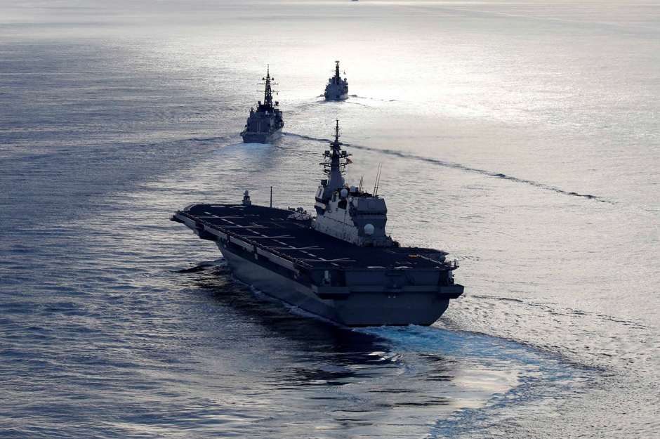 Japanese helicopter carrier Kaga (front) Japanese destroyer Inazuma (C) and British frigate HMS Argyll take part in a joint naval drill in the Indian Ocean. Reuters