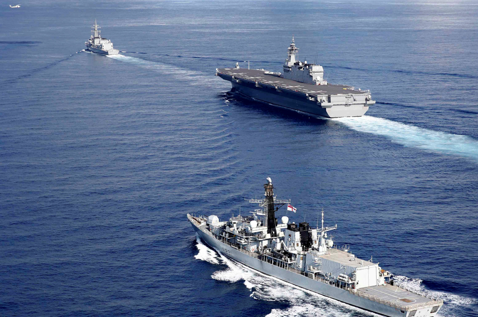 British frigate HMS Argyll (front), Japanese helicopter carrier Kaga (C) and Japanese destroyer Inazuma take part in a joint naval drill in the Indian Ocean. Reuters 