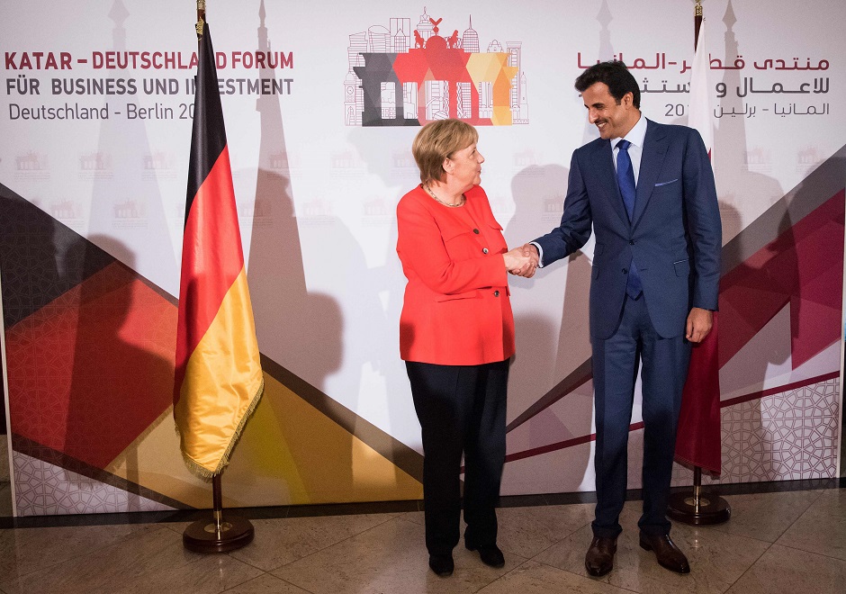 1.German Chancellor Angela Merkel and the Emir of Qatar Sheikh Tamim bin Hamad Al-Thani shake hands at the beginning of the Germany - Qatar Forum on Business and Investment at the Maritim Hotel in Berlin, on September 7, 2018. PHOTO: AFP