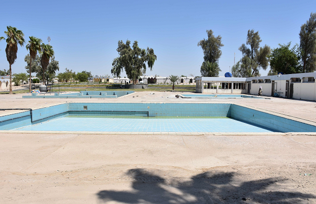 An empty swimming pool at the abandoned resort. PHOTO: AFP