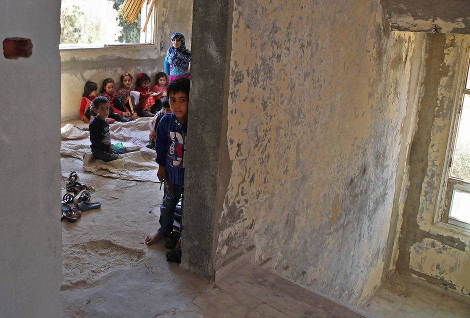 Displaced Syrian children attend class at a makeshift school in the village of Muhandiseen in Aleppo. PHOTO: AFP ALEPPO AFP