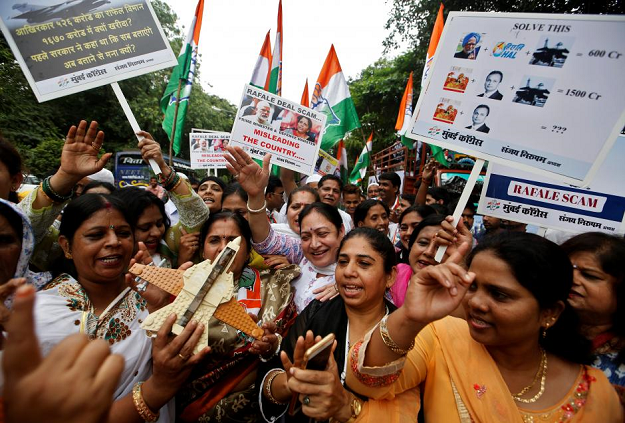 Supporters of Congress Party shout slogans during a protest demanding from government to disclose the details of Rafale fighter planes deal. PHOTO: REUTERS 