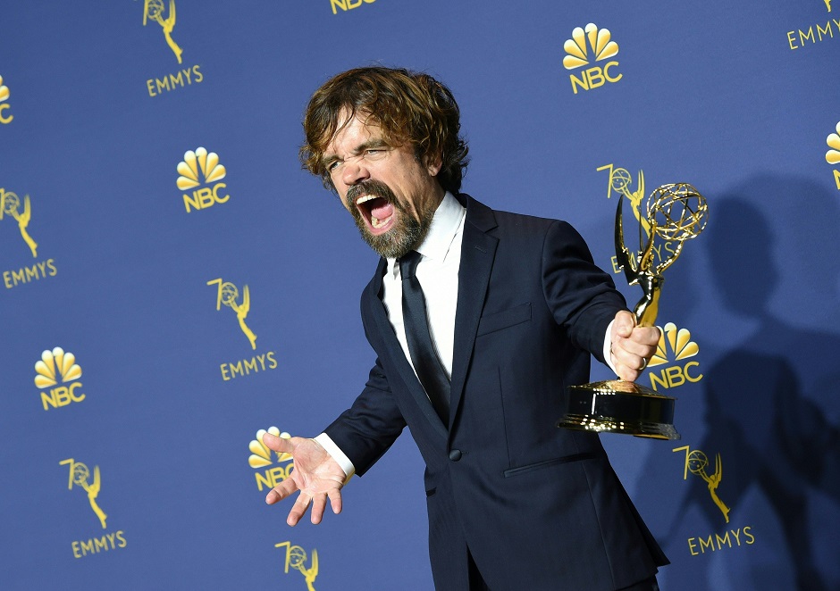 6.Supporting actor in a drama series winner Peter Dinklage poses with his Emmy during the 70th Emmy Awards at the Microsoft Theatre in Los Angeles, California on September 17, 2018.  PHOTO: AFP