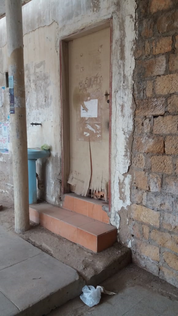 Broken door of faculty washroom. PHOTO: SAFDAR RIZVI/EXPRESS