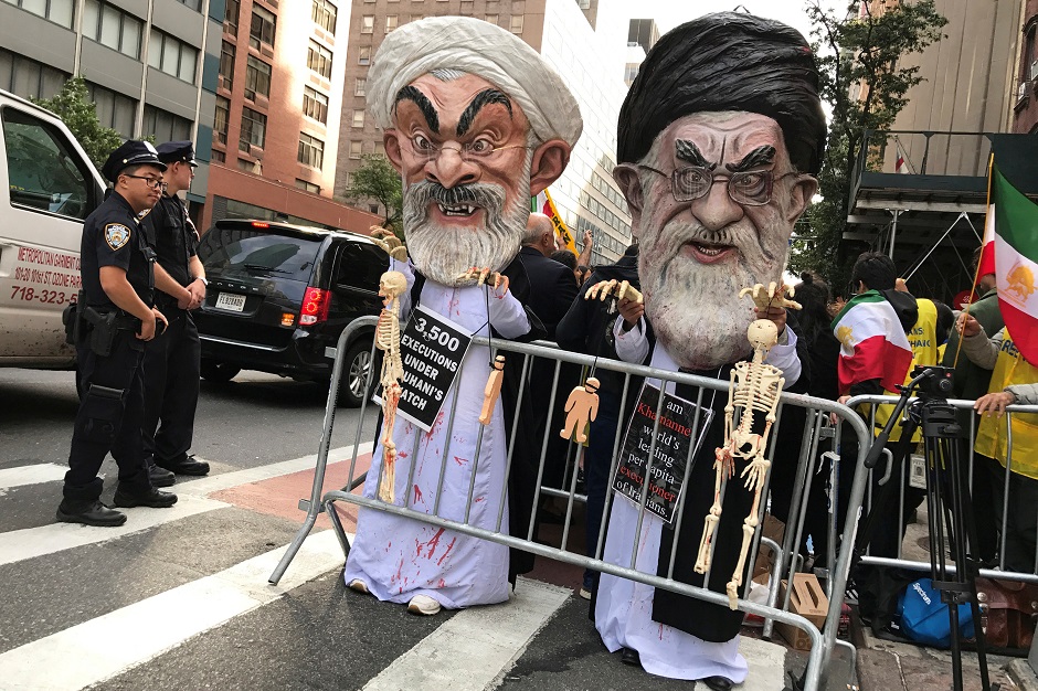People dressed as Iran's Supreme Leader, Ayatollah Ali Khamenei and Iranian President Hassan Rouhani protest on the street against Iran in New York, New York Reuters