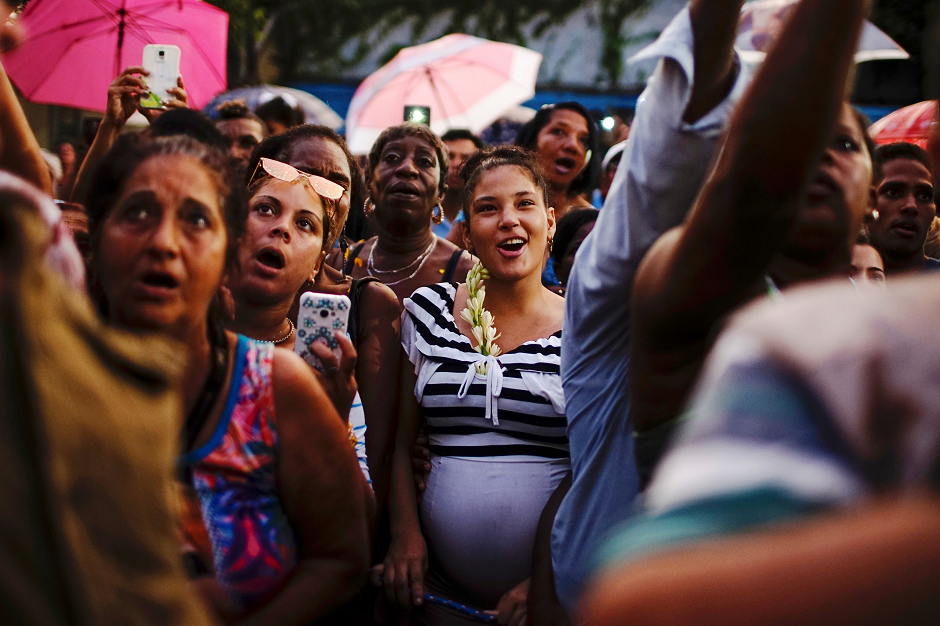 People react during a procession of the Virgin of Regla on the shores of Regla in Havana, Cuba. PHOTO: REUTERS