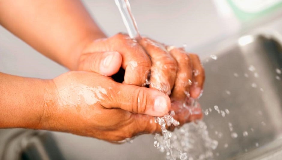A person washing hands. PHOTO: REUTERS