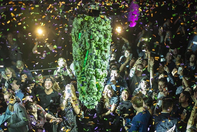 torontonians gather at a local concert venue to watch the bud drop at the stroke of midnight in celebration of the legalisation of recreational cannabis use on october 17 2017 in toronto canada photo afp