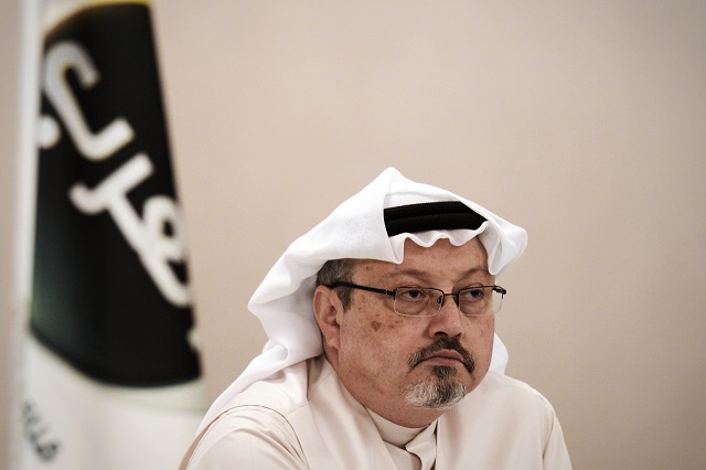 in this photo taken on december 15 2014 general manager of alarab tv jamal khashoggi looks on durina a press conference in the bahraini capital manama photo afp