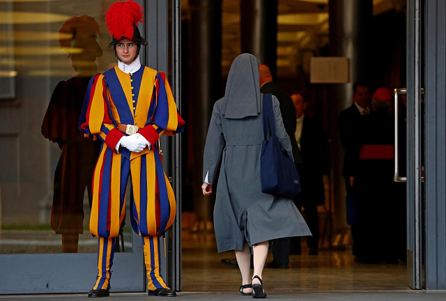 a nun enters to take part at the synod afternoon session led by pope francis at the vatican october 16 2018 photo reuters