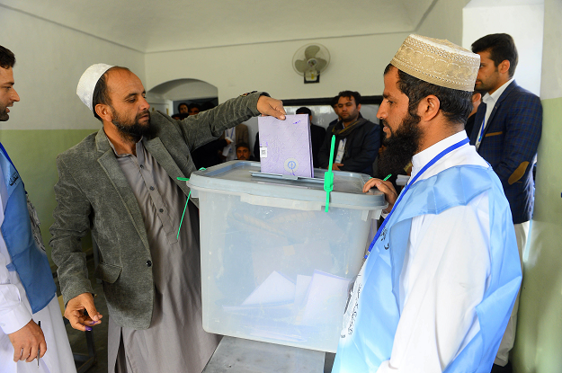 Afghans are bracing for more deadly violence on October 20 as voting gets under way. PHOTO: AFP