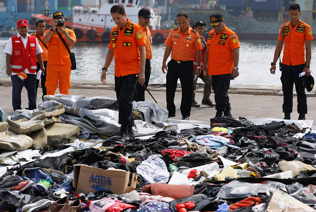  Chief of Indonesia's Lion Air flight JT610 search and rescue operations Muhammad Syaugi looks through recovered belongings. PHOTO: REUTERS