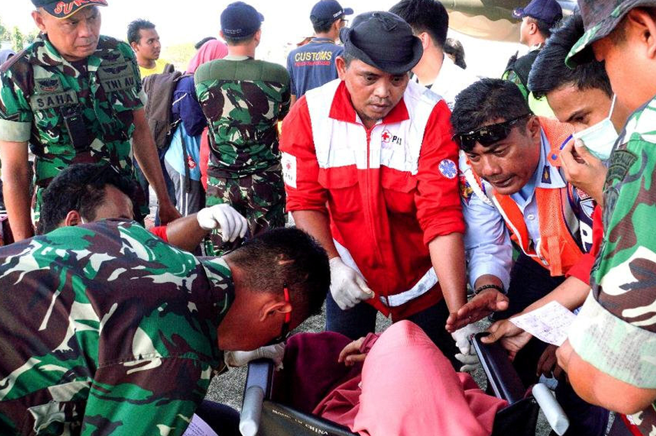 Ambulance and evacuation services are provided by Indonesia Red Cross for affected people at Sultan Hasanuddin Airport, Makassar, Indonesia. Reuters 