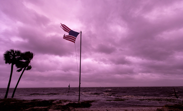 An American flag is seen at Shell Point Beach in Crawfordville, Florida. PHOTO AFP