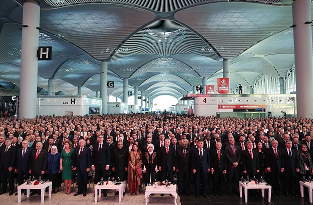 A handout picture taken and released on October 29, 2018 by the Turkish Presidential Press Service shows Turkish President Recep Tayyip Erdogan and his wife Emine Erdogan attending an inauguration ceremony on the opening day of the Istanbul New Airport in Istanbul. - Erdogan opened Istanbul's new international airport, which his government says will eventually become the world's largest, with great fanfare on October 29. PHOTO: AFP