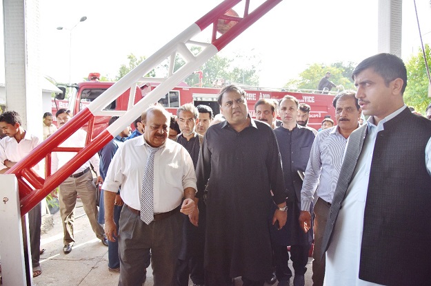Information Minister Fawad Chaudhry arrives at the Press Information Department Building in Islamabad. PHOTO:Zulfiqar Baig/EXPRESS