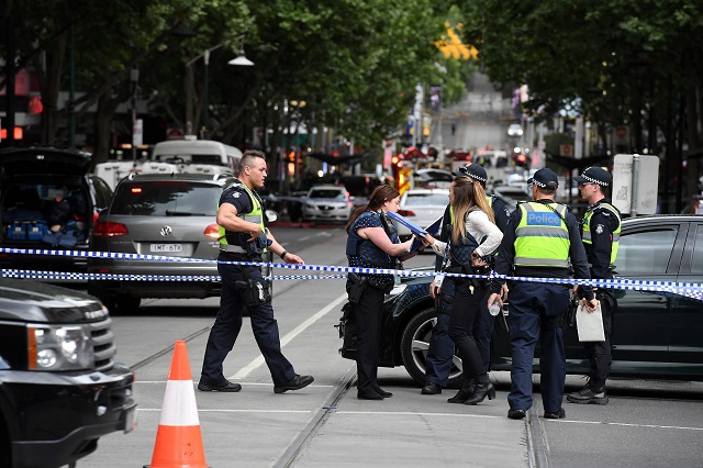 police work at the crime scene following a stabbing incident in melbourne on november 9 2018 photo afp