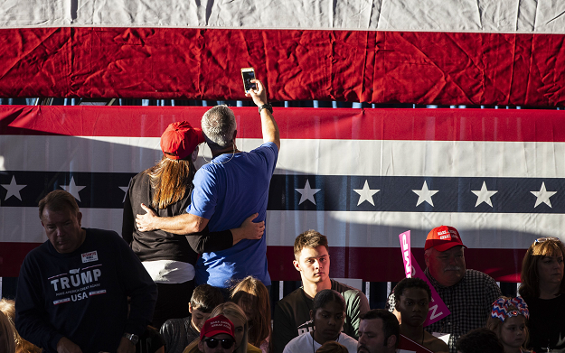 Trump supporters take a selfie. PHOTO: AFP