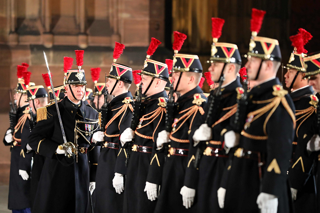 French Republican guards stand during a military ceremony on the forecourt of Notre-Dame Cathedral in Strasbourg. PHOTO: AFP