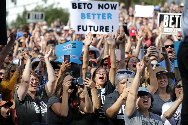 Supporters cheer for U.S. Senate candidate Rep. Beto O'Rourke (D-TX) during a campaign rally at the Pan American Neighborhood Park . PHOTO: AFP