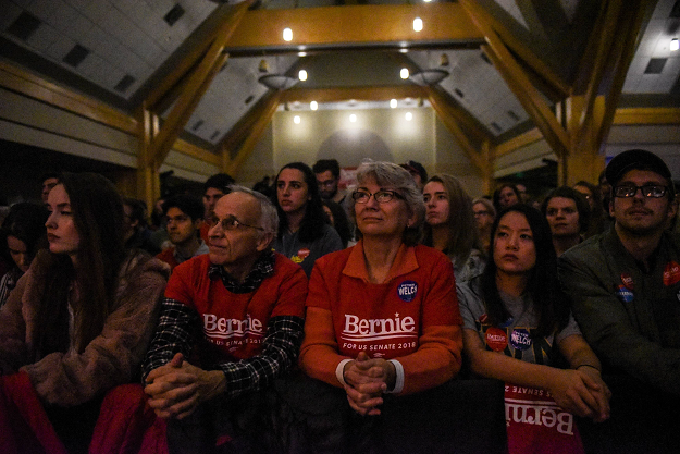 People listen to a speech by Democratic Gubernatorial candidate Christine Hallquist during a 