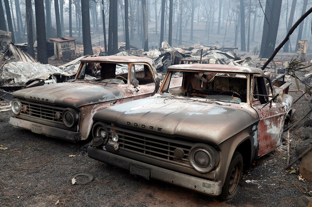  Trucks destroyed by the Camp Fire are seen in Paradise. PHOTO: REUTERS