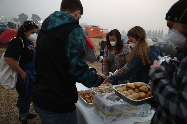 People drop off freshly baked cookies and cupcakes to Camp Fire evacuees. PHOTO: AFP