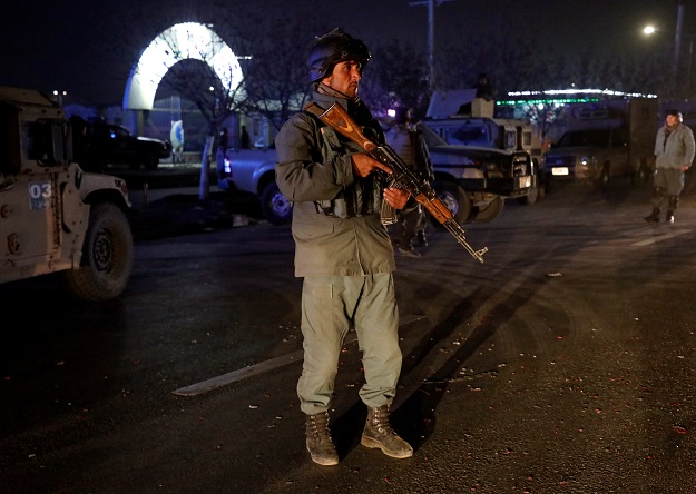 Afghan security forces at the site of the suicide bomb attack in Kabul, Afghanistan on November 20. PHOTO: REUTERS