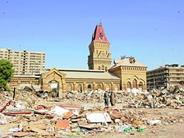 Rumble of grounded shops lay in front of the 18th century old colonial structure of the Empress Market. PHOTO: ATHAR KHAN