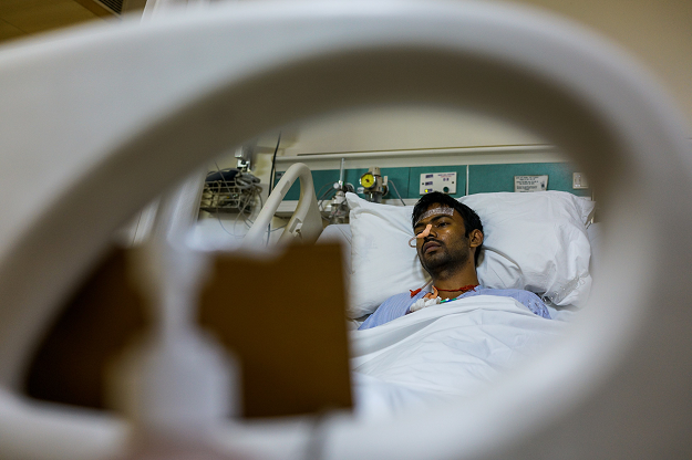In this photograph taken on November 3, 2018, Yogesh Kumar rests after undergoing an operation to remove a diseased lung at Shri Ganga Ram hospital in New Delhi. PHOTO: AFP