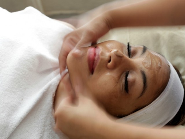 Representational image of a woman receiving face massage. PHOTO: REUTERS