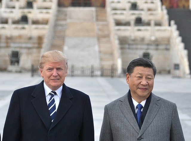 us president donald trump and chinese president xi jinping pose at the forbidden city in beijing in november 2017 photo afp