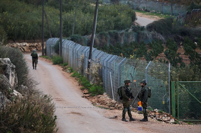 israeli soldiers guard near the border with lebanon in the town of metulla northern israel photo reuters