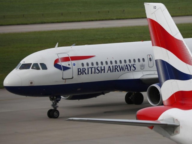 British Airways planes parked at Heathrow Terminal 5 in London, Britain. PHOTO: REUTERS