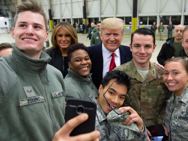 US President Donald Trump and First Lady Melania Trump greet members of the US military during a stop at Ramstein Air Base in Germany. PHOTO: AFP