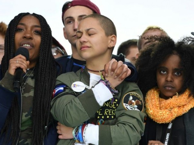 Emma Gonzalez (C), a student at Marjory Stoneman Douglas High School, at the "March For Our Lives" protest. PHOTO: AFP