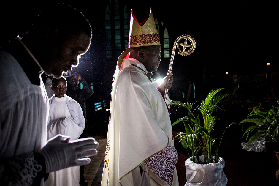 Archbishop of Kinshasa, Fridolin Ambongo Besungu, is pictured at the start of Christmas Mass celebrations at the Notre Dame de Kinshasa cathedral. PHOTO: AFP