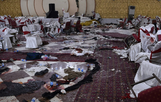 Suicide attacks, like this one on a wedding hall in Kabul, have added to a year of record bloodshed in Kabul. PHOTO: AFP