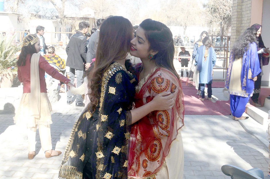 Christian girls hug and congratulate each other on the occasion of Christmas Day at the Methodist Church in Quetta, Baluchistan. PHOTO COURTESY: PPI/IMAGES