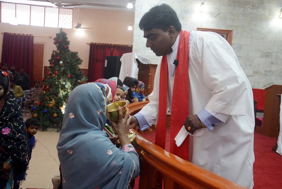 Christian worshippers observe Christmas Day prayers and rituals at the Methodist Church in Quetta, Baluchistan. PHOTO COURTESY: PPI/IMAGES