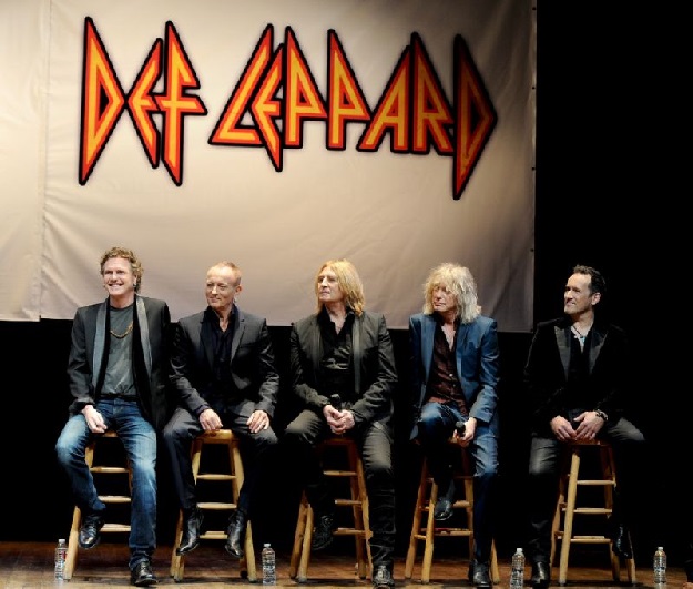 (L-R) Musicians Rick Allen, Phil Collen, Joe Elliott, Rick Savage and Vivian Campbell of Def Leppard pictured on March 17, 2014 in West Hollywood. PHOTO: AFP