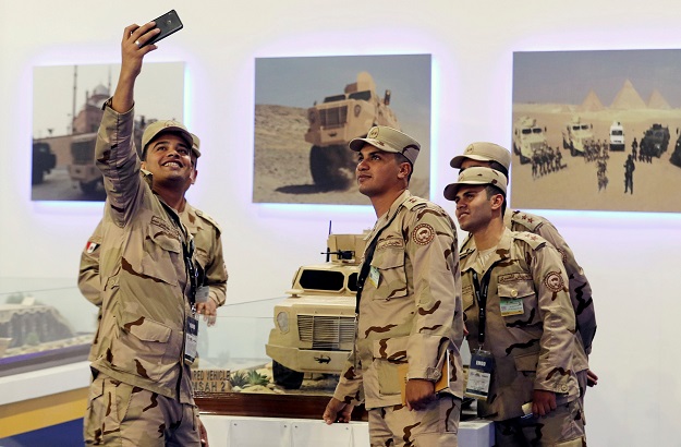 12.A made in Egypt TEMSAH 3 (Crocodile 3) military vehicle is displayed on the Egyptian stand during on the first day of Egypt Defense Expo PHOTO: REUTERS